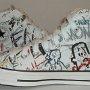 Rock and Roll High Top Chucks  Inside patch views of white punk print high tops.