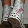 Rock and Roll High Top Chucks  Wearing white punk print high tops, rear view 4.