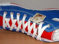 Royal Blue and Red 2-Tone High Top Chucks  Royal and red 2-tone left high top, new with tag, front and inside view.