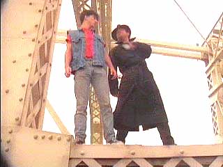 Suddenly Billy Joel appears on the bridge