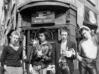 The Sex Pistols  Street pose of the band. Sid Vicious and John Lydon are wearing chucks.