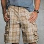 Ads for Shorts  Plaid dungaree cargo shorts with black low cut chucks.