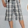 Ads for Shorts  Ad for Urban Pipeline plaid shorts with black low cut chucks.