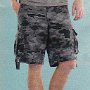 Ads for Shorts  Ad for camouflage shorts with black low cut chucks.