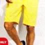 Ads for Shorts  Ad for yellow shorts with black low cut chucks.