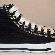 Simple Details High Top Chucks  Outside view of a right black simple details high top with wide white laces.