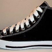 Simple Details High Top Chucks  Outside view of a left black simple details high top with wide white laces.