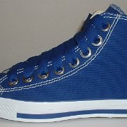Simple Details High Top Chucks  Outside view of a left royal blue simple details high top.