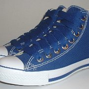 Simple Details High Top Chucks  Angled side view of royal blue simple details high tops.