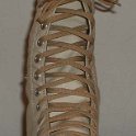 Skate Shoelaces on Knee High Chucks  Tan 96 inch shoelaces on a right parchment knee high.