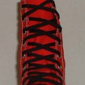 Skate Shoelaces on Knee High Chucks  Black 84 inch shoelaces on a right red knee high.