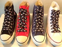 Skull Print Shoelaces On Chucks  Black and white skull print shoelace on core color high tops.