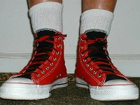Socks for Your Chucks  Crew socks with red and black 2-tone high tops, front view.