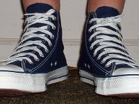 Socks for Your Chucks  No show socks worn with navy blue high tops, front view.