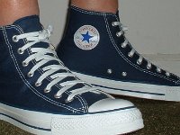 Socks for Your Chucks  No show socks worn with navy blue high tops, right side view.