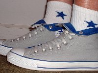 Socks for Your Chucks  Rolled down gray and royal high tops with white and royal quarter high embroidered star socks.