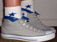 Socks for Your Chucks  Rolled down gray and royal high tops with white and royal quarter high embroidered star socks.