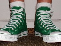 Socks for Your Chucks  All white quarter high socks worn with Celtic green high tops, front view.