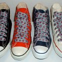 Star Print Shoelaces on Chucks  Core high top chucks with red and silver star print shoelaces.