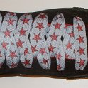 Star Print Shoelaces on Chucks  Black anarchy high top chuck with red and silver star print shoelaces.