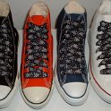 Star Print Shoelaces on Chucks  Core high top chucks with black and silver star print shoelaces.