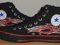 Tattoo High Top Chucks  Inside patch views of monochrome black and red tattoo high tops.