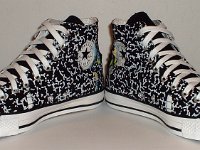 Tear Away High Top Chucks  Angled front view of black and white tear away high tops.
