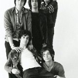 The Strokes  Posed shot of the band. Fabrizio Moretti shows off his black high top chucks.