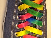 Tie Dye Shoelaces on Chucks  Navy Blue low cut chuck with rainbow tie dye shoelaces.