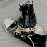 Trashed High Top Chucks  Rear and right inside views of trashed black leather jewel high tops.