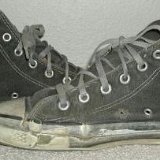 Trashed High Top Chucks  Inside patch views of well worn black high tops.