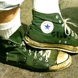 Trashed High Top Chucks  Side views of trashed green high tops.