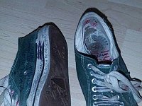 Trashed Low Cut Chucks  Well worn green low cuts, sole and top views.