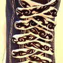 Tribal Band Shoelaces on Chucks  Tribal band print shoelace on a navy blue high top chuck.