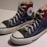 Tri-Color Chucks  Angled side view of blue, green, and maroon tri-color high tops.