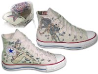 Tropical and Nautical Pattern Chucks  Side views of white Sailor Jerry high tops.
