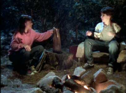 Betty Ann and David by the campfire
