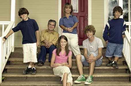 The Roloff family sitting on their front porch