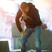 Vince Staples  Vince wears black chucks while on stage.