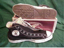 Vintage black high tops shown with their original box