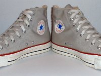 Vintage Grey High Top Chucks  Vintage grey high tops, angled front view.