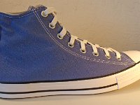 Washed Indigo High Top Chucks  Outside view of a right washed indigo high top.