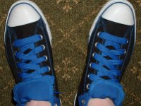 Wearing Rolled Down High Top Chucks  Top view of black and royal foldovers with fat royal blue laces.
