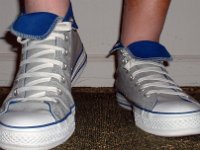 Wearing Rolled Down High Top Chucks  Front view of gray and royal foldovers laced using the "Triangle" method with classic white shoelaces.