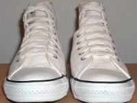 White Leather Jewel High Top Chucks  White leather jewel high tops, front view.