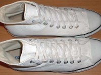 White Leather Jewel High Top Chucks  White leather jewel high tops, top view.