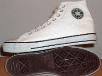 White Leather Jewel High Top Chucks  White leather jewel high tops, outside patch and sole views.