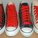 Fat (Wide) Red Shoelaces on Chucks  Core color high tops with wide red laces.