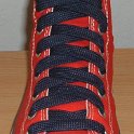 Fat (Wide) Navy Blue Shoelaces on Chucks  Red high top with wide navy blue laces.