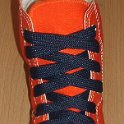 Fat (Wide) Navy Blue Shoelaces on Chucks  Orange high top with wide navy blue laces.